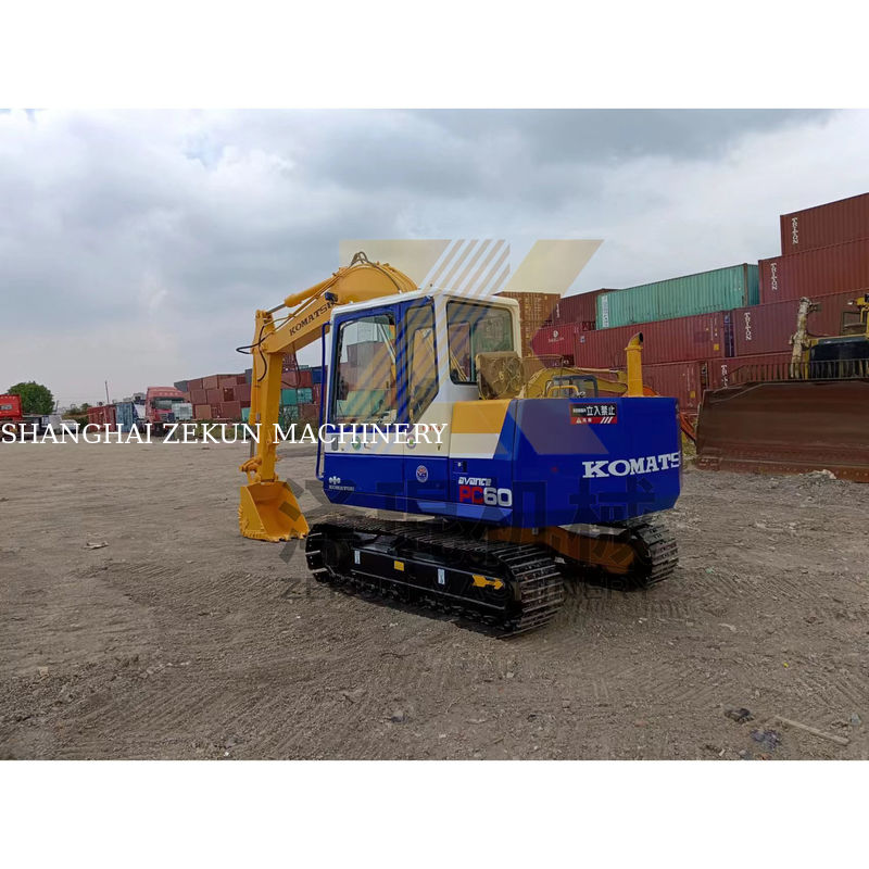 Excavadora usada Komatsu PC60-5 em bom estado com outro cilindro hidráulico e em 2022