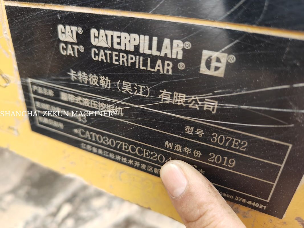 Excavadora CAT 307E2 de 2019 com alcance máximo ao nível do solo de 400 mm e capacidade do tanque de combustível de 135 l